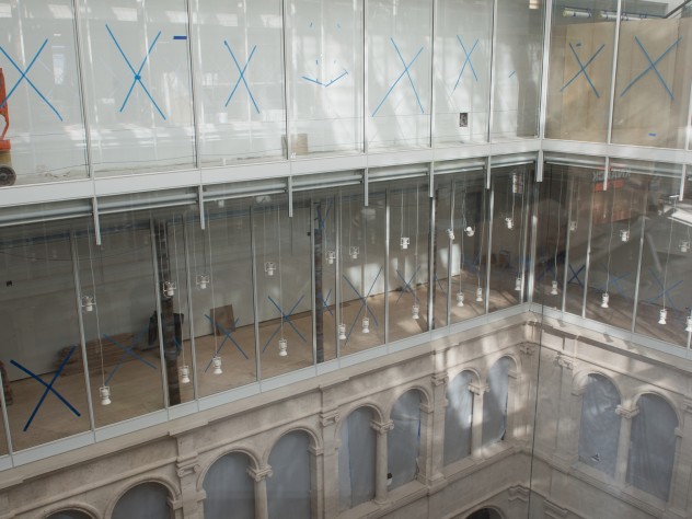Photograph by Jim Harrison Glass walls in the upper stories of the courtyard afford oblique views into the art study and conservation spaces of this teaching museum, and allow natural light to diffuse through the interior.