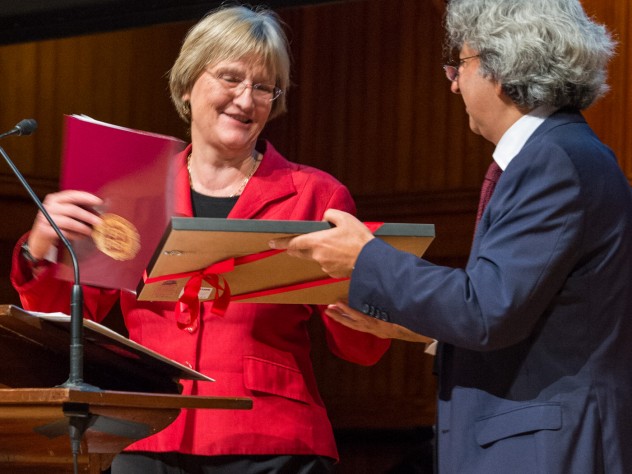 Justin Knight Photography GSD dean Mohsen Mostafavi awards President Drew Faust an honorary certificate naming her a “grounded visionary” during Friday’s opening event in Sanders Theatre.