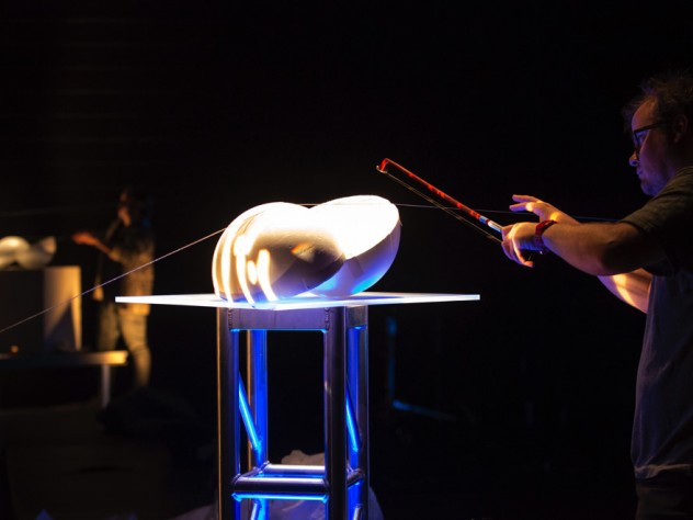 ICE percussionist Ross Karre "plays" an aircraft cable.