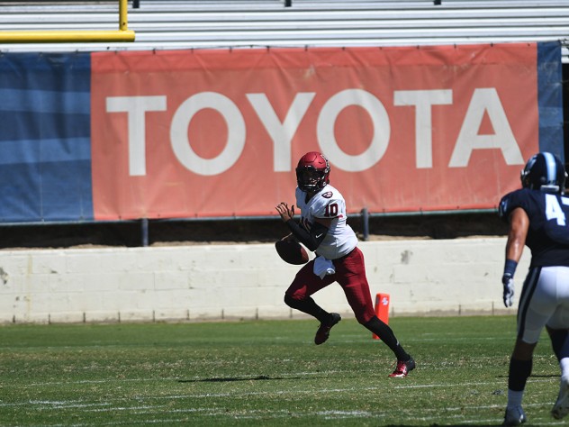 Passing grade: Back as a starter, junior quarterback Jake Smith survived a rough first half to complete 22 of 39 passing attempts and fire three scoring passes.