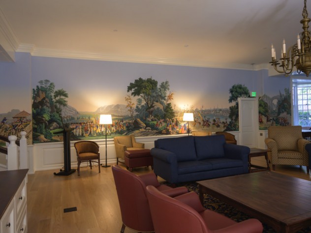 An elaborate mural, displaying an early American scene.