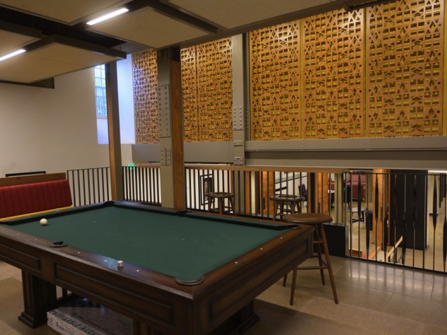 A multi-level common with a pool table in front