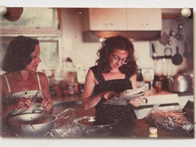 Undated snapshot of Marilyn Pappas and Jill Slosburg-Ackerman as younger women cooking together.
