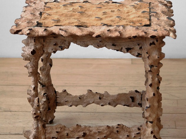A small table titled "Edward Snowden," 2004, by Jill Slosburg-Ackerman.