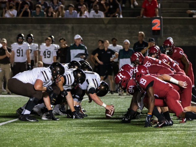 The Harvard defense lines up against the Brown offense.