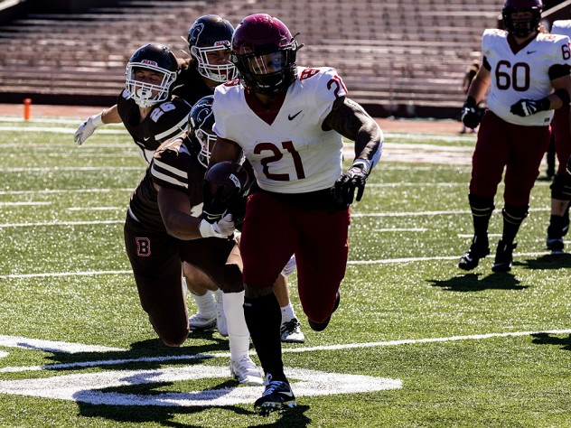 Aidan Borguet scores Harvard’s final touchdown on 67-yard run.