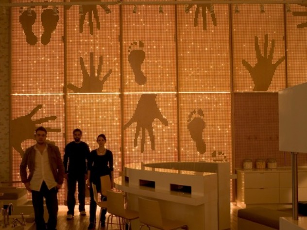 Photograph courtesy of MERGE architects Hand- and footprint logos suggest the nail business's focus.