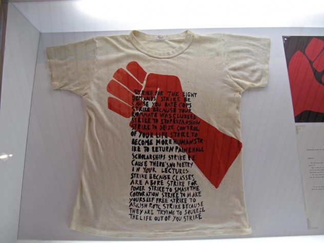 Photograph by Harvard Magazine/JC After the “Bust,” GSD students returned to Robinson Hall to teach themselves the new craft of silk-screening overnight, and created T-shirts emblazoned with the symbol for protestors—with the caveat that they would never be used as souvenirs.