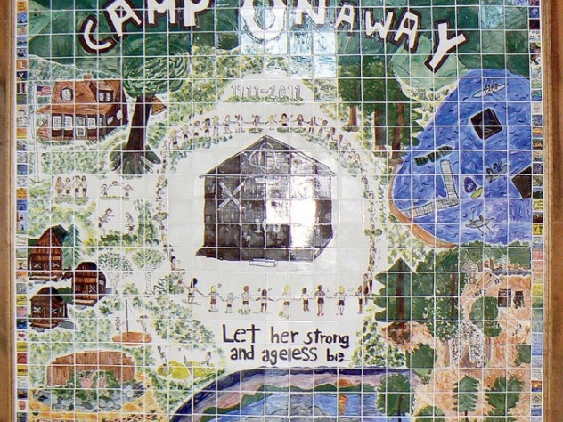 A mural designed by 2011 campers to celebrate Onaway’s centennial summer by highlighting its many traditions