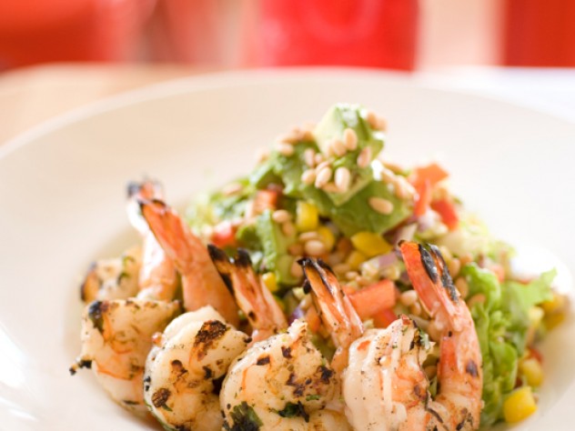 Grilled shrimp adds color to The Omega, a salad with avocado, corn, and cilantro.