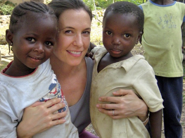 Photograph courtesy of Teresa Betancourt At left, Betancourt with young friends Binta and Christopher in Koidu Town, Kono District, Sierra Leone.