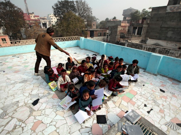 Photograph by Peter Pereira The center urges children to attend school, but many of them are urged by their parents to contribute income by working or begging.