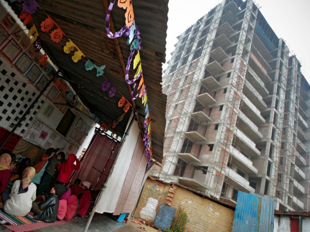 Photograph by Peter Pereira Under Indian law, construction sites with a certain number of female workers are supposed to operate a childcare center, but few do. The nongovernmental organization Mobile Crèches contracts with some construction companies to run such centers, like this one in Gurgaon.