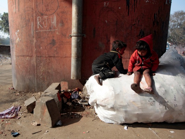 Photograph by Peter Pereira The large number of travelers passing through represent the possibility of income from such activities as selling soap, collecting empty water bottles for resale, and begging.