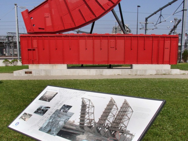 Photograph courtesy of Ross Miller A historical marker in Rolling Bridge Park shows the history of crossings over Fort Point Channel.