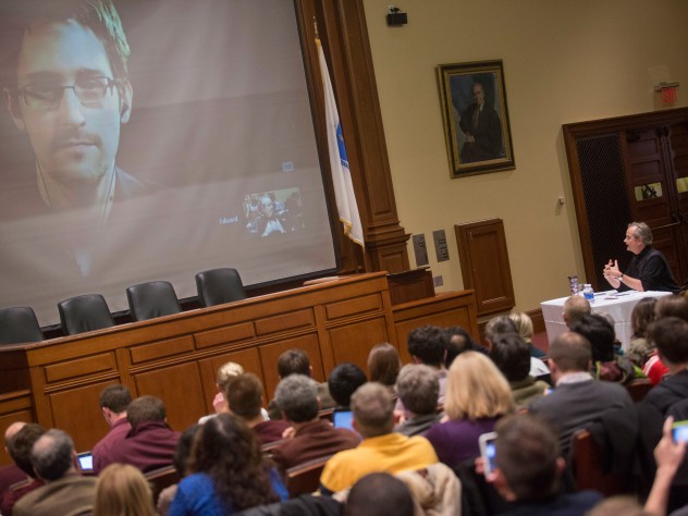 The scene in Ames Courtroom as Lawrence Lessig spoke with Edward Snowden
