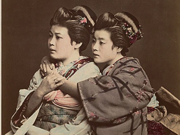 1870s Japan: a hand-tinted albumen print by Raimund von Stillfried showing two women posing