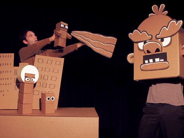Brad Shur performing in his new show, Cardboard Explosion!