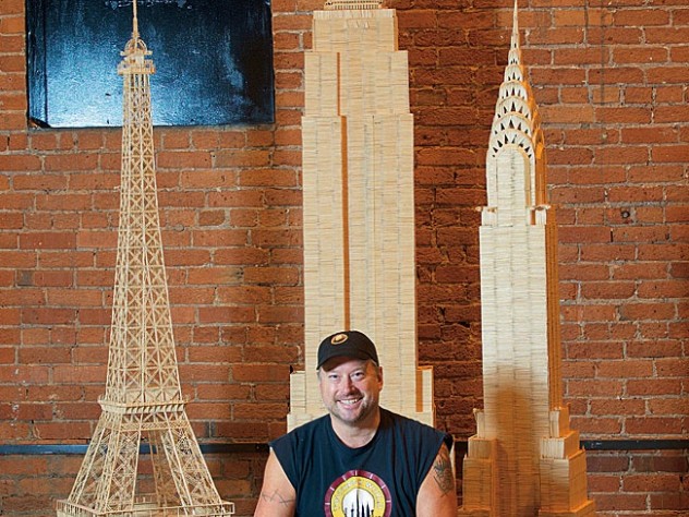 Towering over Munro are his “toothpicked” versions of the Eiffel Tower and the Empire State and Chrysler buildings.