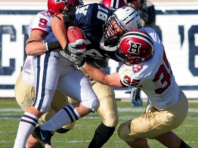 The eventual 45-7 victory also included the Murphy era trademark rugged defense, as practiced by linebacker Bobby Schneider (35).