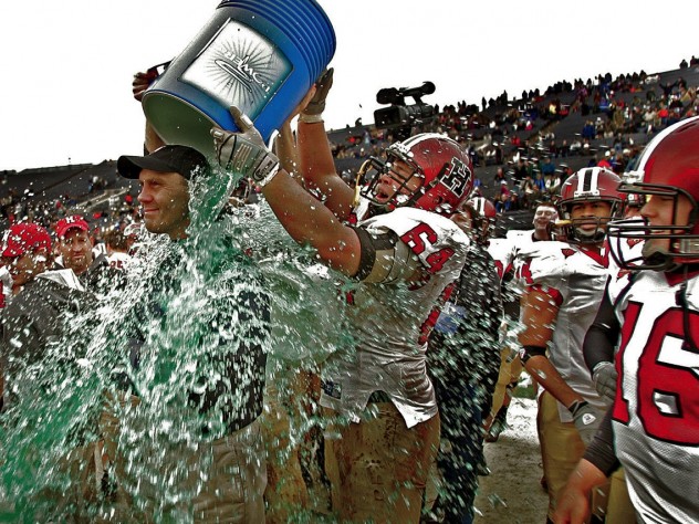 Familiar sights: Murphy received the celebratory traditional Gatorade shower after the 2007 win.
