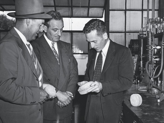 Walker, with visitors, in his lab in 1948