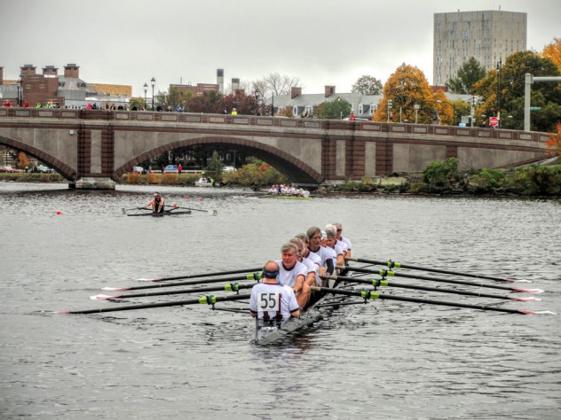 With Olmsted at stroke, the rowers set out from Newell Boathouse toward the starting line.