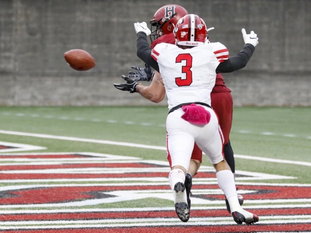 Having beaten Cornell defensive back Jake Watkins, Harvard's Ryan Reagan awaits a pass from quarterback Jake Smith. The junior tight end's 12-yard scoring grab was the Crimson's final touchdown of the day.