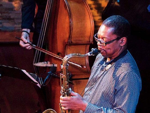 Ravi Coltrane viewed from the top, playing a saxophone