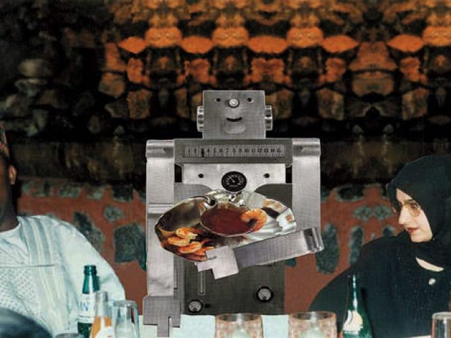 Robo Entertains Guests at an elegant Nigerian dinner party are served by a boxy metallic robot.