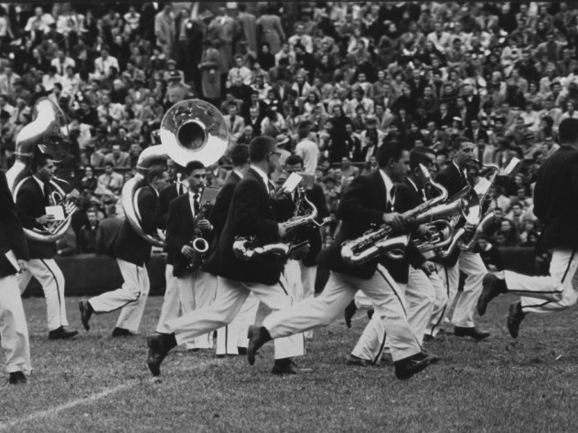 Bandsman scramble to get into a new formation at halftime