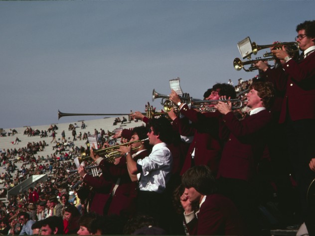 The trumpet section leads a cheer