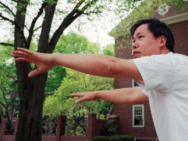 Master Yon Lee Master Yon Lee extends his hands in a tai chi pose.