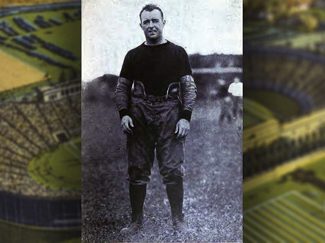 Charles Brickley pictures alone in an old-fashioned football uniform