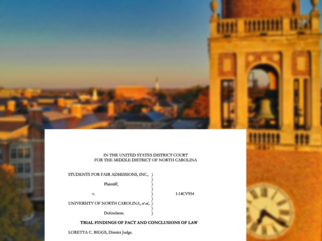 Court document in the foreground with UNC Chapel Hill bell tower in the background