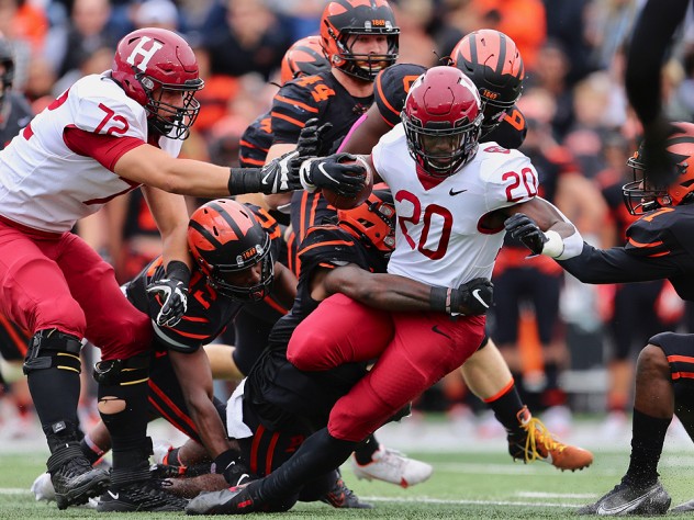 Aarom Shampklin tackled by Princeton defenders