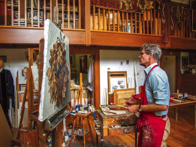 Jason Bouldin at work on a painting in his studio