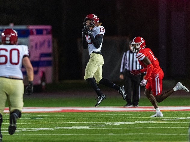 Harvard's Ledger Hatch snares one of his five receptions, tied for team-high.