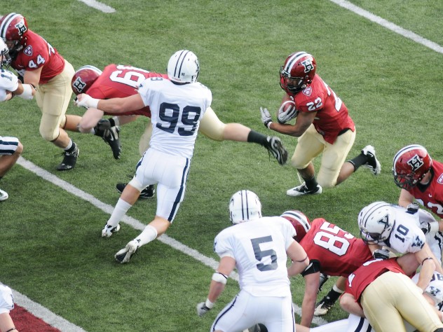 Photograph by Meredith Keffer Yale’s defense held Gino Gordon ’11, Harvard’s all-Ivy running back, to 36 yards rushing, but couldn’t keep him out of the end zone. Gordon rushed for short-yardage touchdowns in both halves of The Game. At the team’s postseason banquet he received the Crocker Award as the team’s most valuable player.