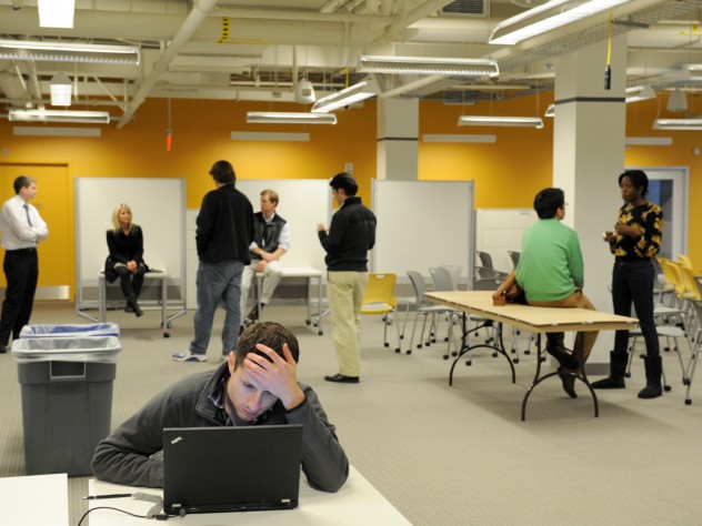 Users arrange themselves in the lab's flexible workspaces.