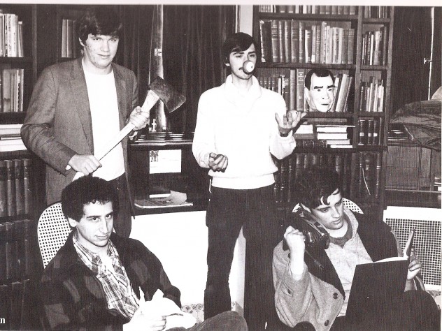 A 1981 photograph taken in the Lampoon Castle shows <i>Simpsons</i> stalwarts Mike Reiss ’81 (seated left) and Al Jean ’81 (holding an iron). Patric Verrone ’81, who juggles pool balls behind them, is also a successful TV comedy writer with <i>Simpsons</i> credits. Holding the axe is the late Ted Phillips ’81, who became a lawyer in South Carolina and passed away in 2005. He has a character (Duke Phillips) named after him in <i>The Critic,</i> an animated series created by Jean and Reiss.