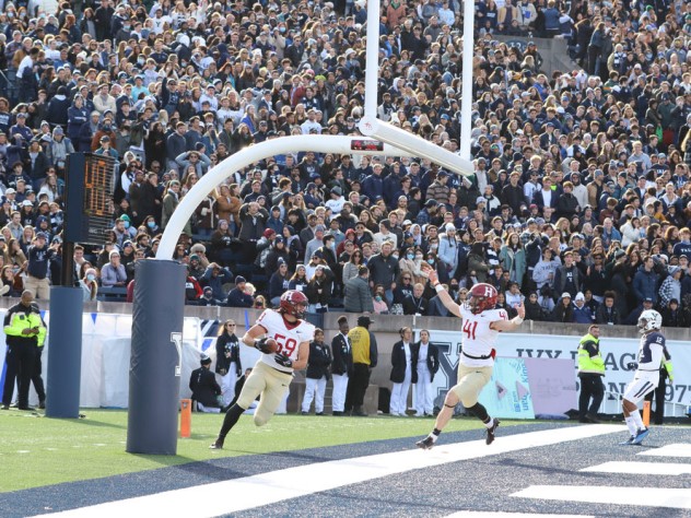 Harvard celebrates a touchdown in the endzone.