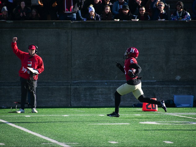 Scot Woods II makes Harvard’s first touchdown on a 64-yard catch and run, tying the game.
