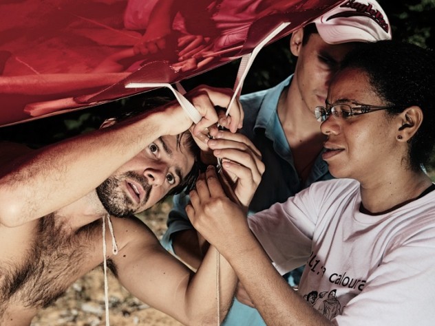Photograph by Jake Bryant/www.envirofoto.com Flores, Tapajós, and Rosa Maria Nascimento dos Santos attach a tether to the balloon prior to launch