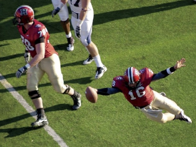 Photograph by Gil Talbot/Harvard Sports Information Office Quarterback Collier Winters dove for Harvard’s third touchdown in a 37-20 defeat of Penn.