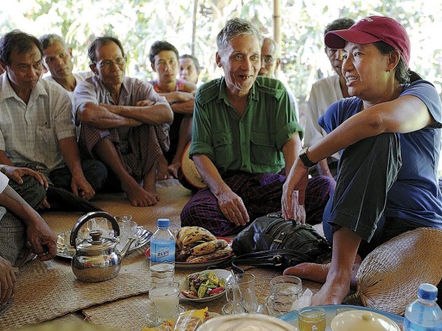 Photograph © Tim Mitzman for Proximity Designs 2013, unless otherwise noted Debbie Taylor and residents of A Phaung Gyi and surrounding villages discuss credit, solar lights—and an alarming pest preying on the ripening rice crop.