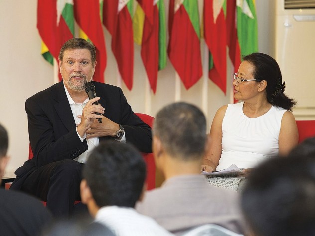 Photograph © Tim Mitzman for Proximity Designs 2013, unless otherwise noted Kennedy School dean David Ellwood and Debbie Taylor at a Myanmar Peace Center forum in Yangon last October