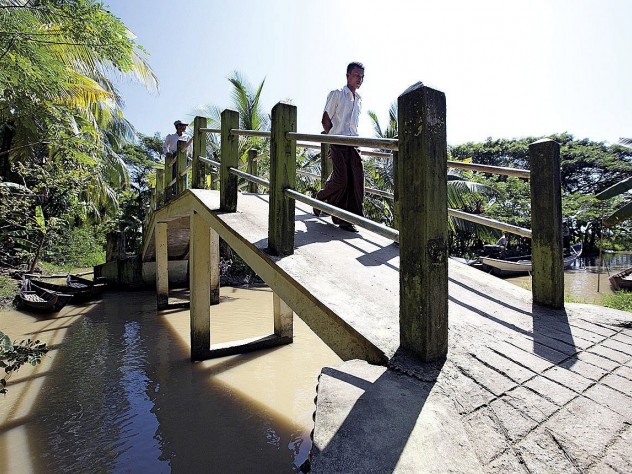 Photograph © Tim Mitzman for Proximity Designs 2013, unless otherwise noted After Cyclone Nargis, aid funds distributed by Proximity boosted the economy and infrastructure, like this new, safer bridge in A Phaung Gyi.