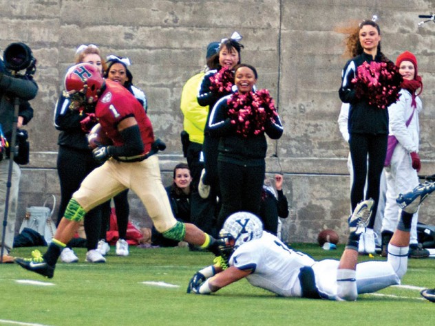 Photograph by Robert Worley The play that made “slant and go” part of Crimson lore: having put a double move on Yale’s Dale Harris, Andrew Fischer ’16 capered into the end zone after catching the winning pass from Conner Hempel with 55 seconds left.