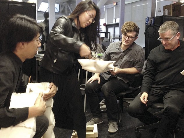 John Wang &rsquo;16 and Angie Jo &rsquo;16, at left, present a component of the cast arch they built in the construction lab to teaching assistant Alex Timmer and course head Mark Mulligan, far right.